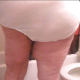 Ms. Poop Alot shits in her panties, and some of the poop spills out of her panties and onto the bathroom floor! She later pulls down the panties and shows off the huge load and mess left on her ass. 